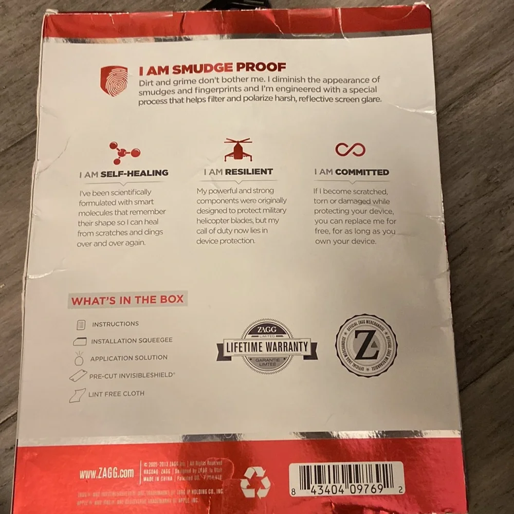 Zagg invisible shield smudge proof screen-cut to size for multiple phone uses